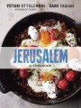 Cover of book Jerusalem: a cookbook, with a round black skillet of eggs and tomatoes sprinkled with herbs