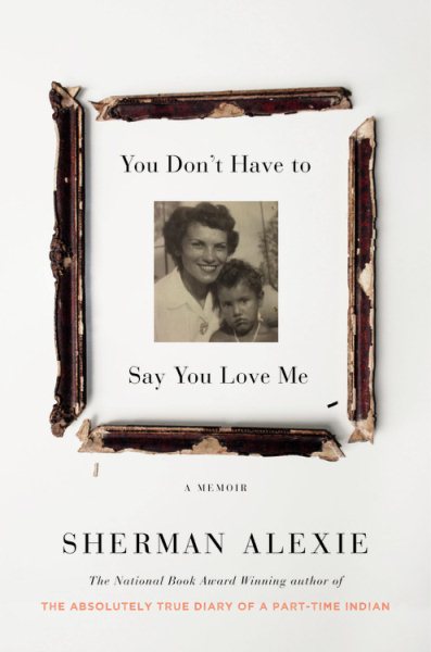 photograph of young Alexie and his mother in black and white surrounded by beat up broken up pieces of picture frame--book cover image